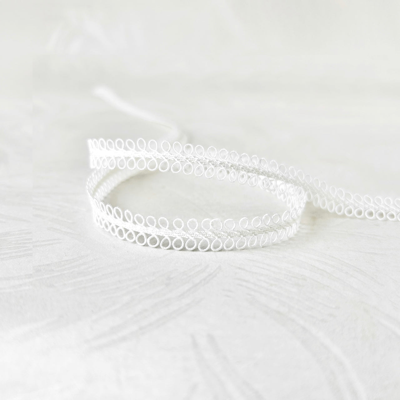 Delicate_Double_Loop_Braid